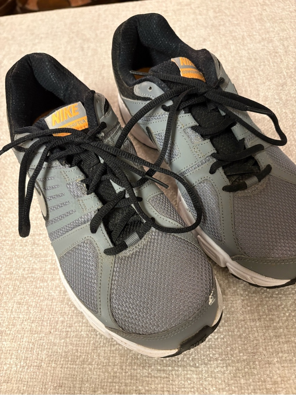 Nike Men’s Gray and Black DownShifter 5 Running Shoes with Orange Logo Size 9.5